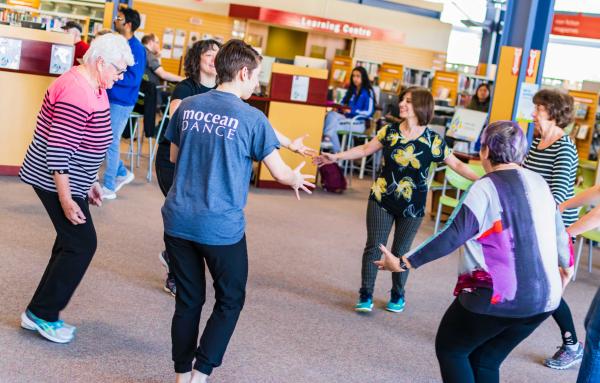 Dancing in the library with a community group