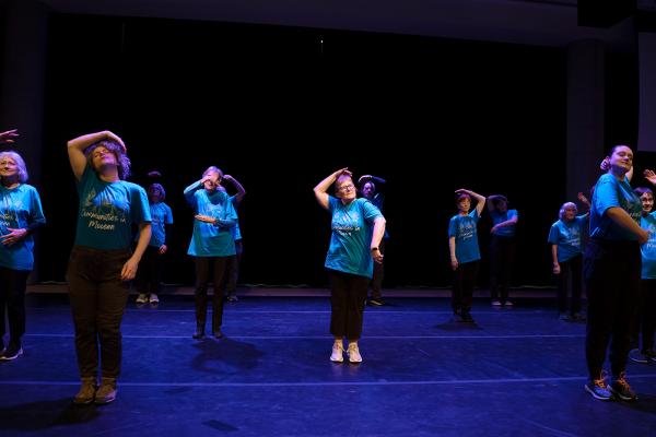 Senior dancers in blue t-shirts