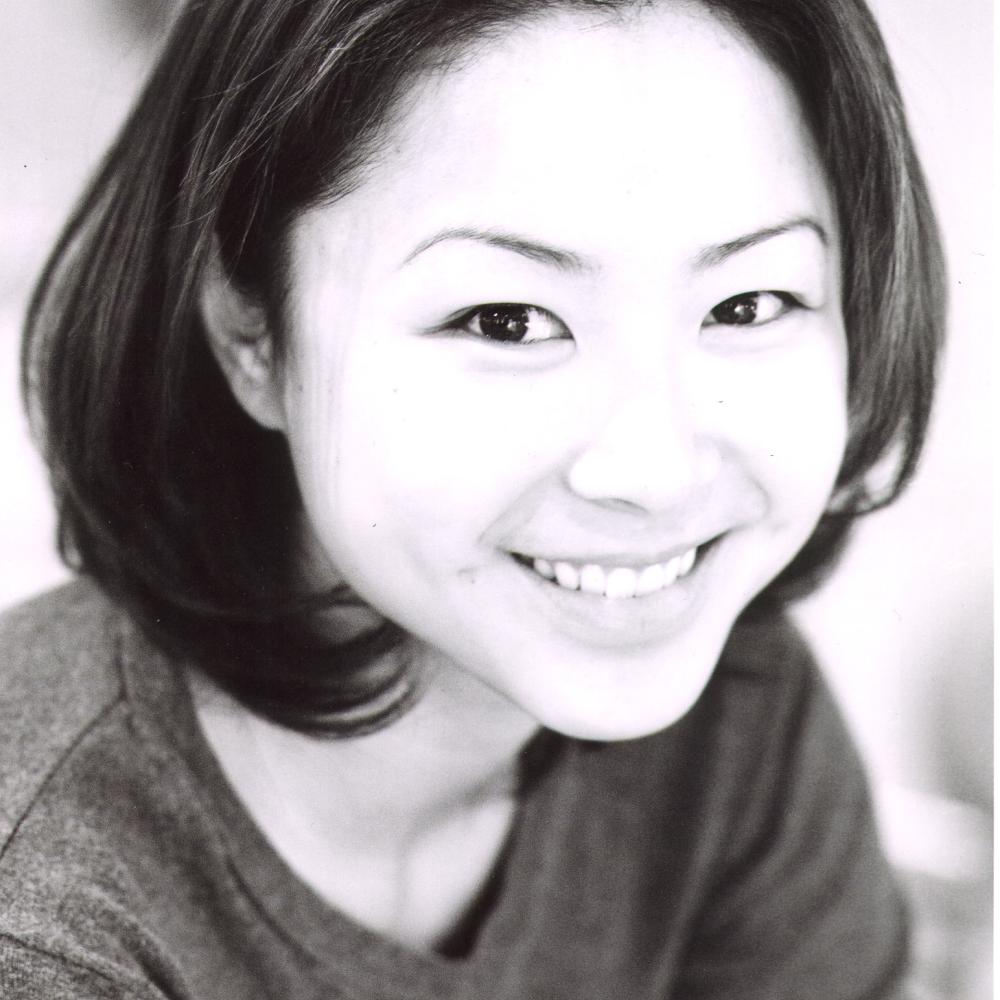 Black and white photo of a Chinese Canadian woman with short black hair